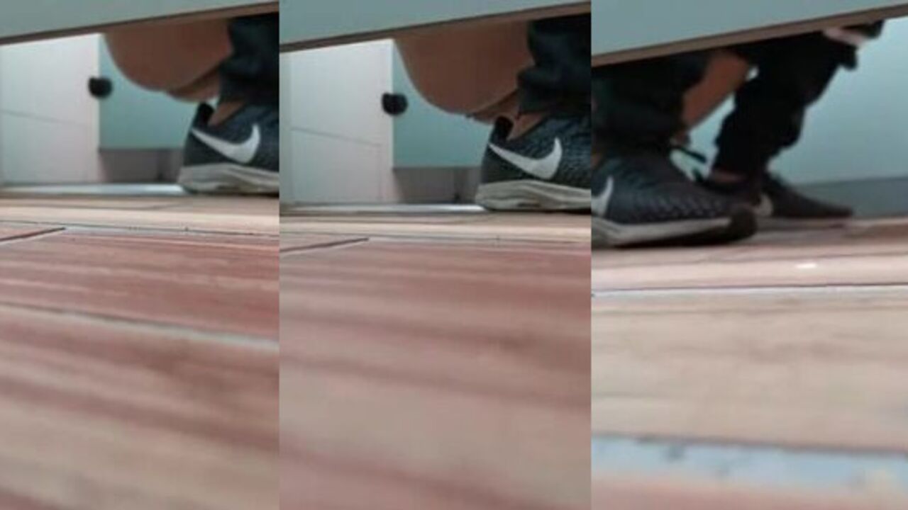 Watch as voyeur dudes take turns pissing in a men's toilet