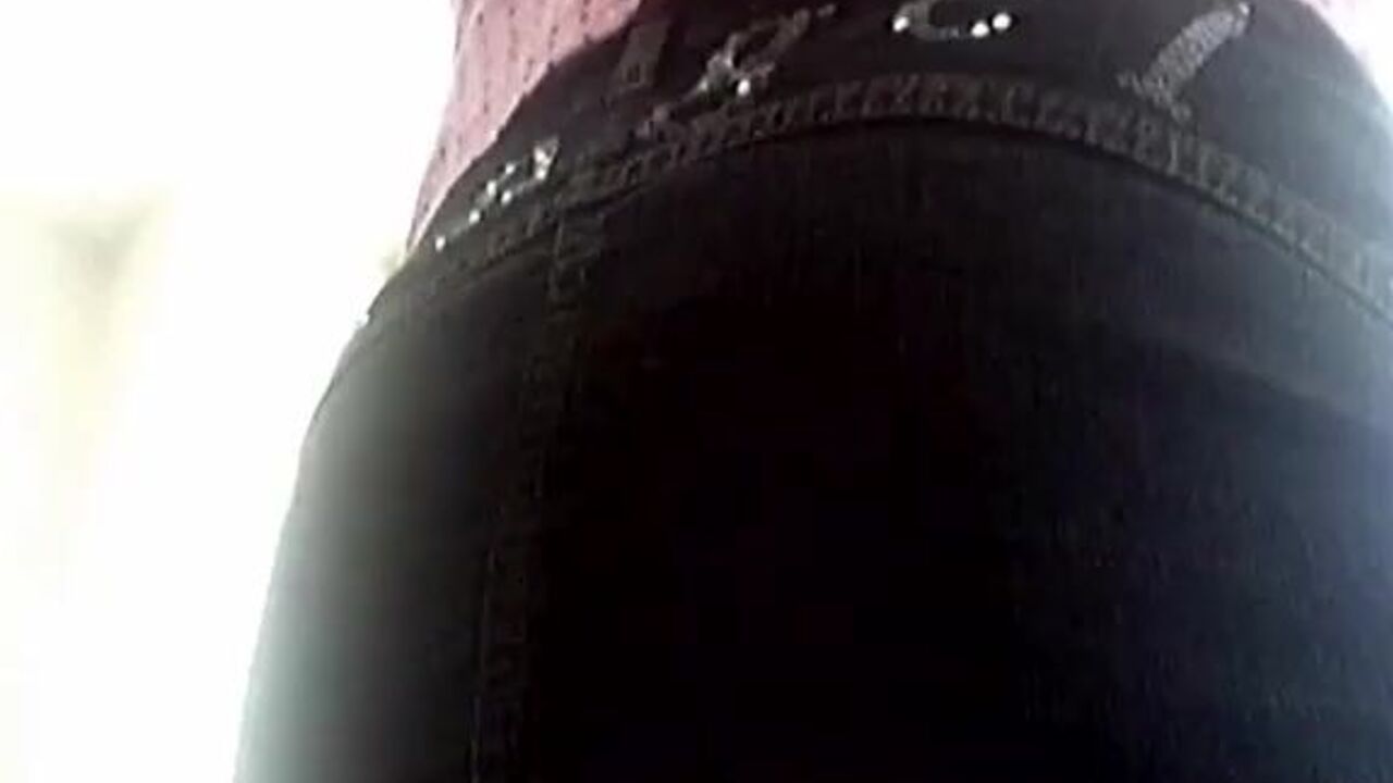 Watch this kinky girl get her pink plastic pants scuffed and splattered with mess