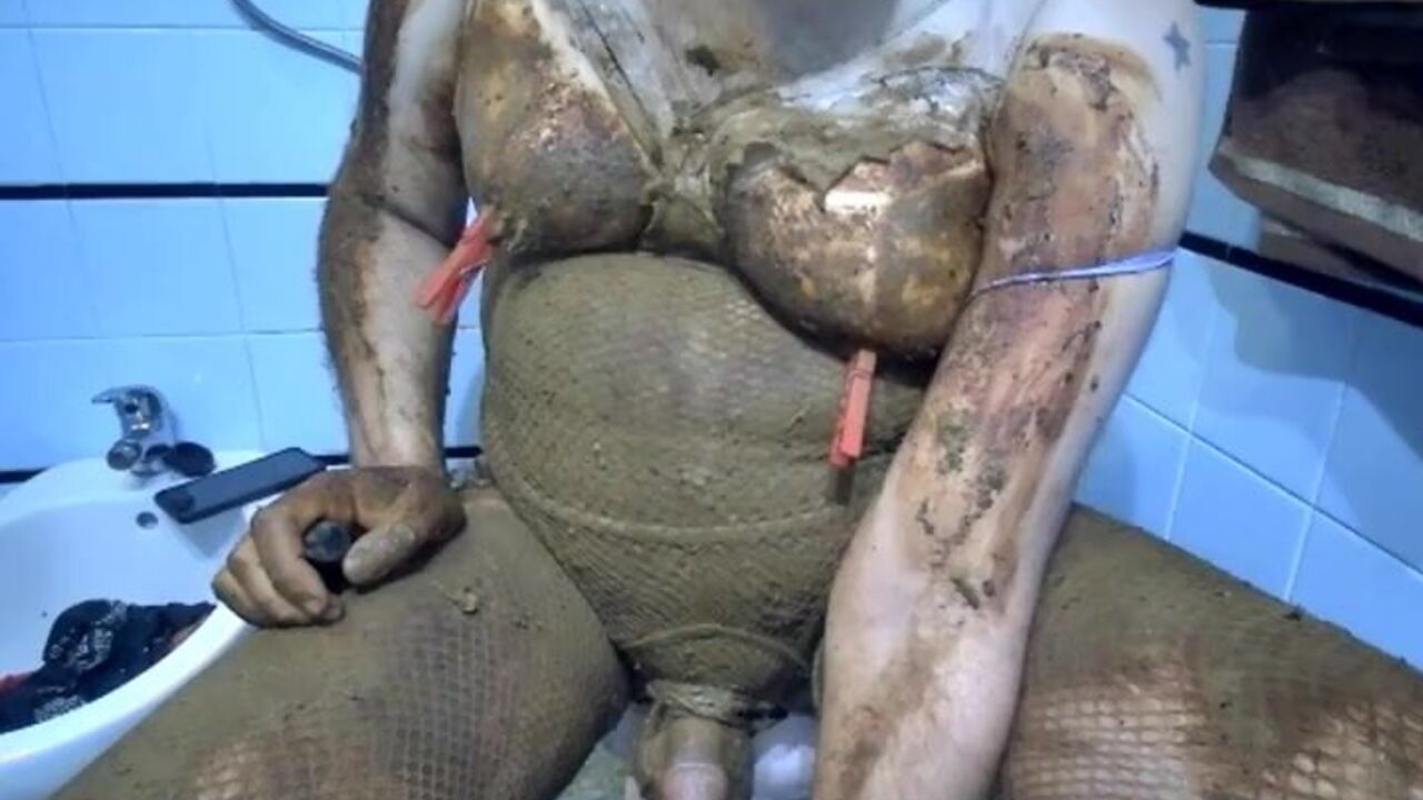 Watch this kinky Diaper Crossdress get off on pee and scat action