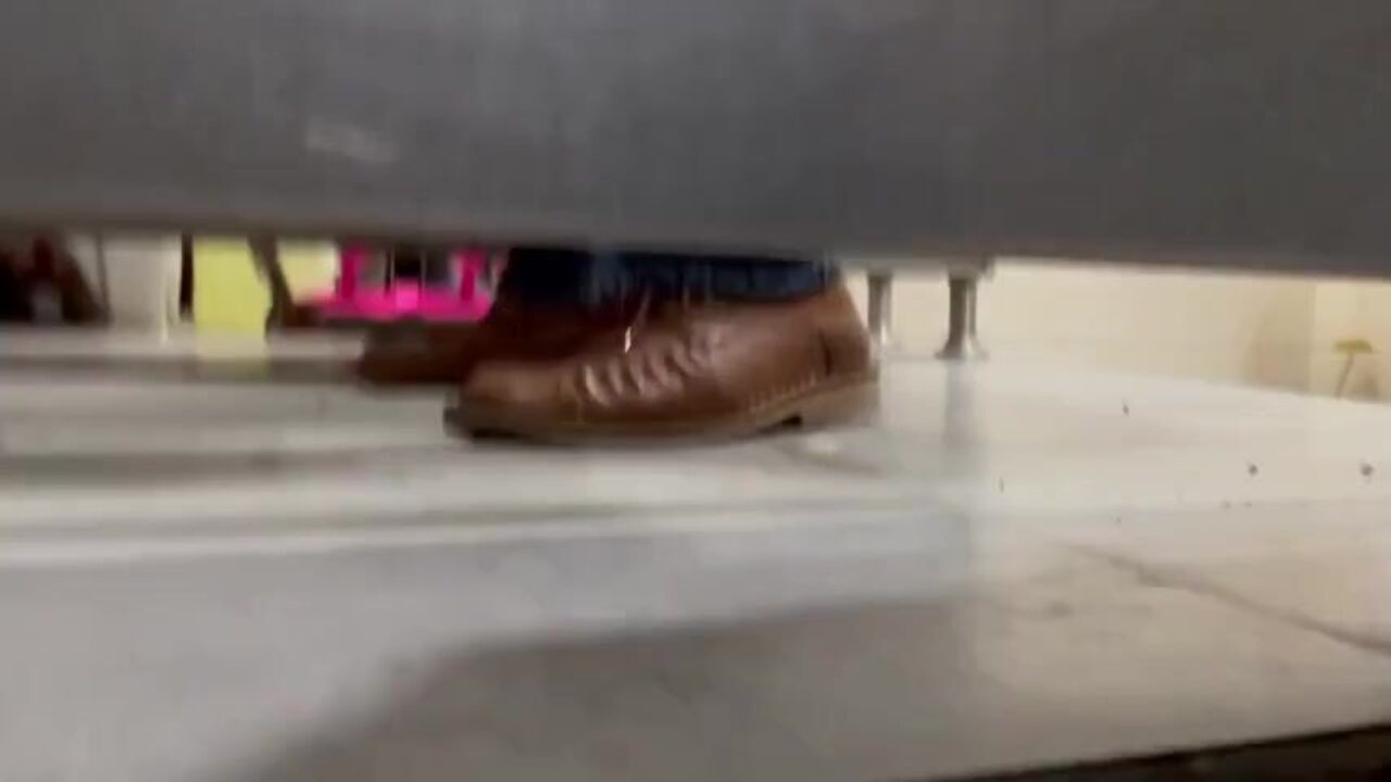 Watch as a voyeuristic guy pees in his own toilet while being watched