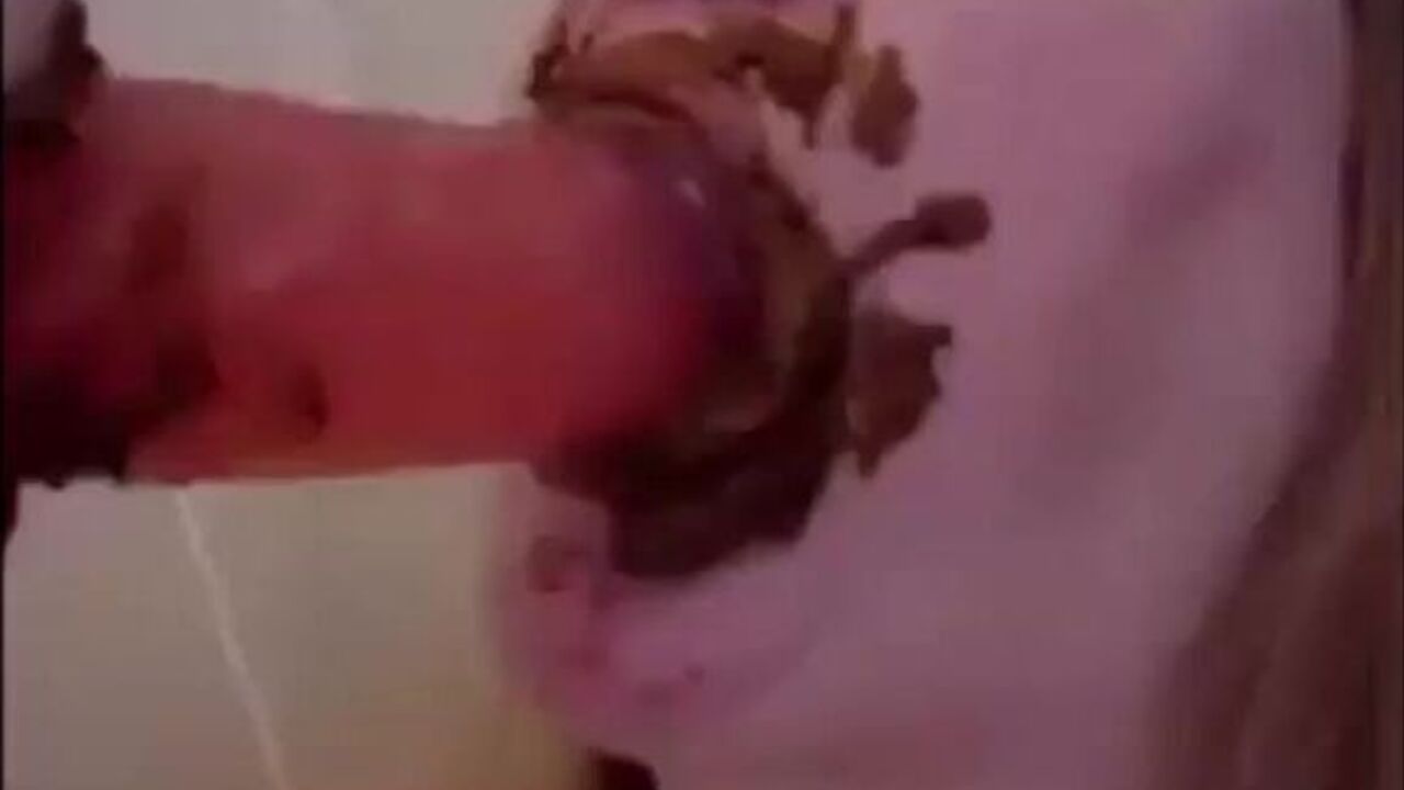 Watch this dirty slut scat and suck on a terrible dildo