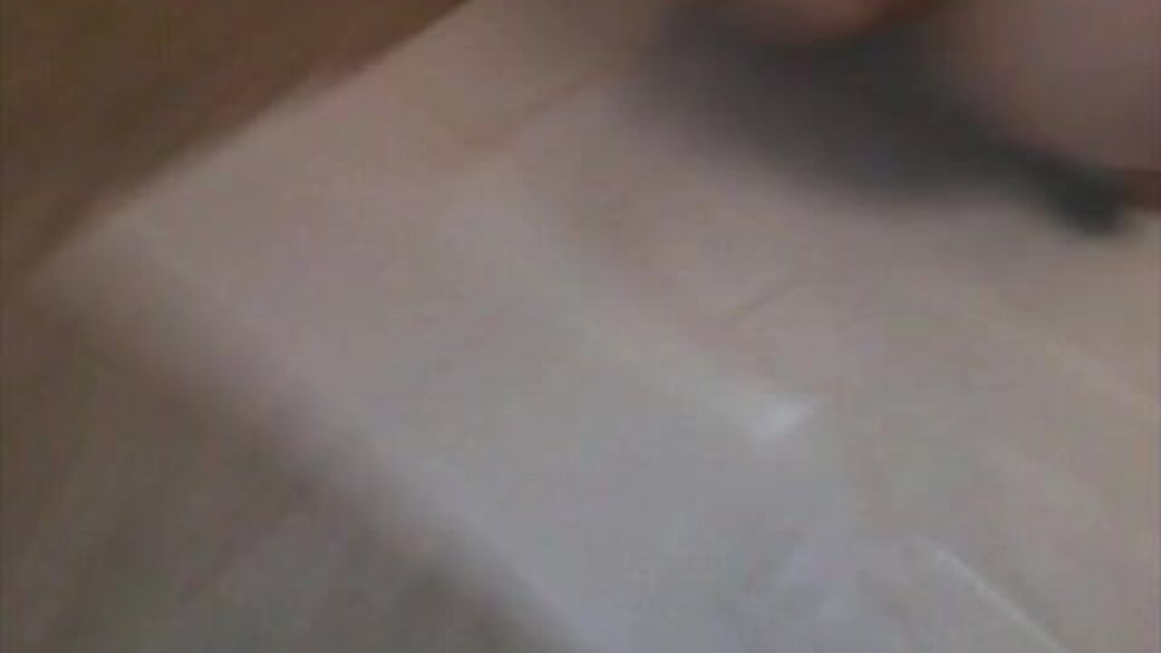 Watch this kinky porno scat slave get her feet drenched in pee & dumped on the floor