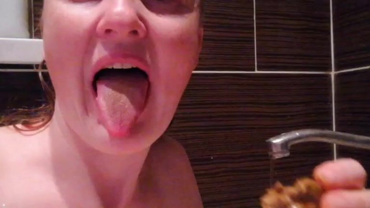 Oiled up slut gets her scat pounded in this scat porn video