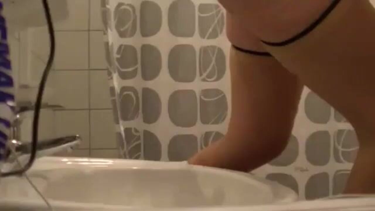 Watch this filthy slut scat and get drenched in her own filth