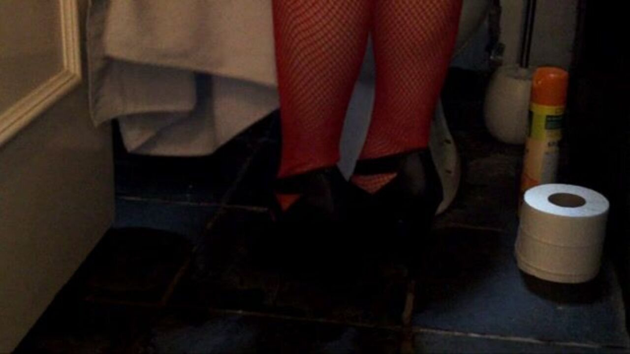 Watch this kinky red fishnet scat babe getting wild and kinky