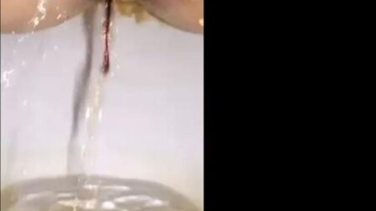 Kinky girl gets a surprise golden shower while her period is gone