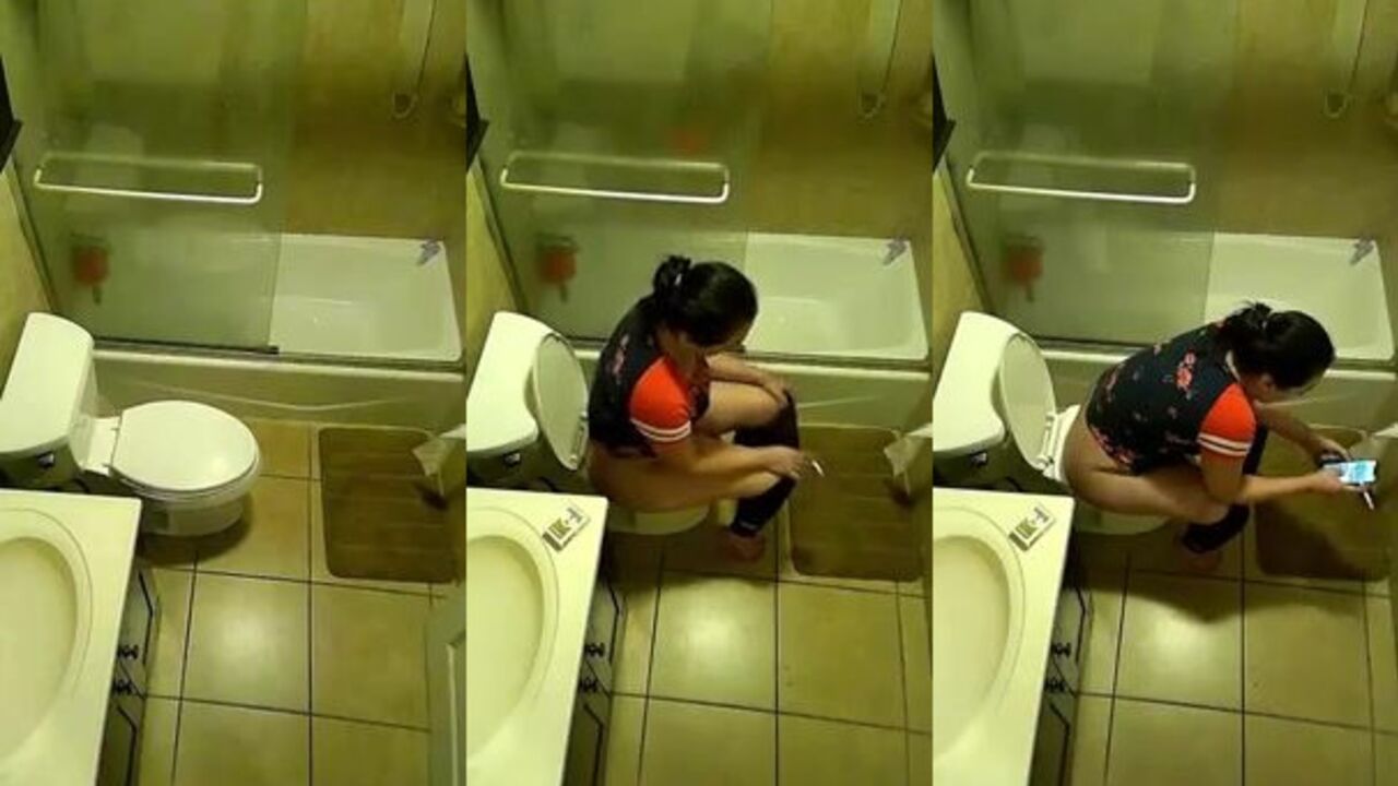 Watch this kinky slut take a leak in secret on camera - watch her get covered in her own urine!