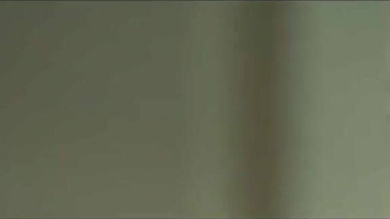 Sexy catsuit-clad lesbians strapon each other in hot latex action