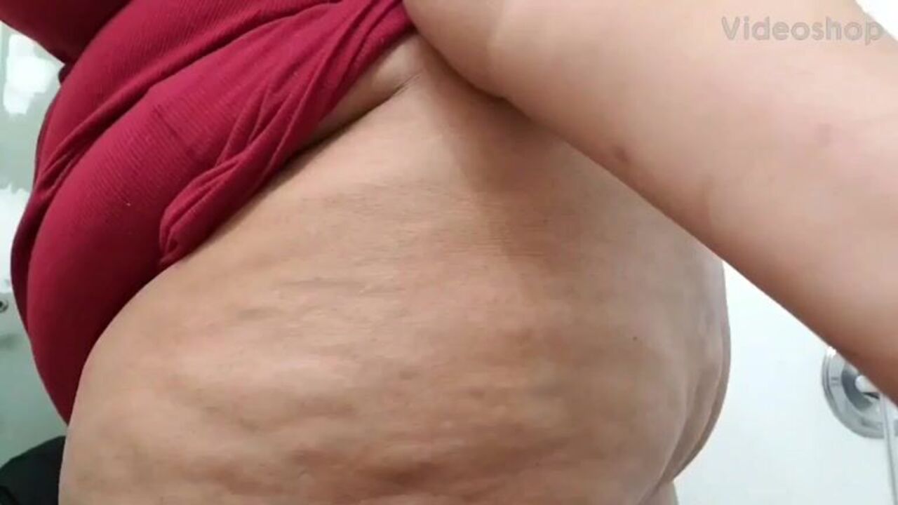 Watch this BBW scat while she poops in her own urine