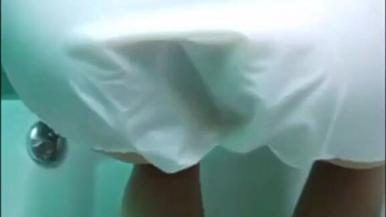 Watch this filthy girl get a messy surprise from her diaper-clad mistress