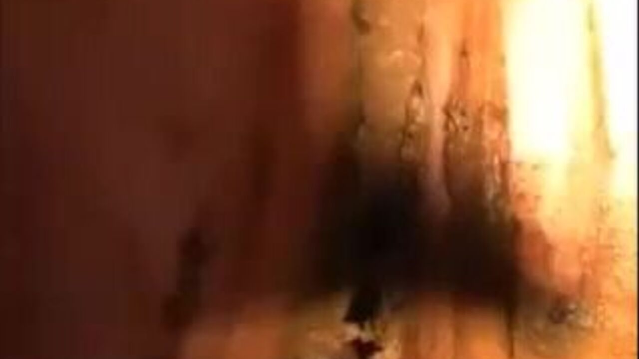 Watch this kinky slut gush her load all over her scat while scatting and spreading it wide open!