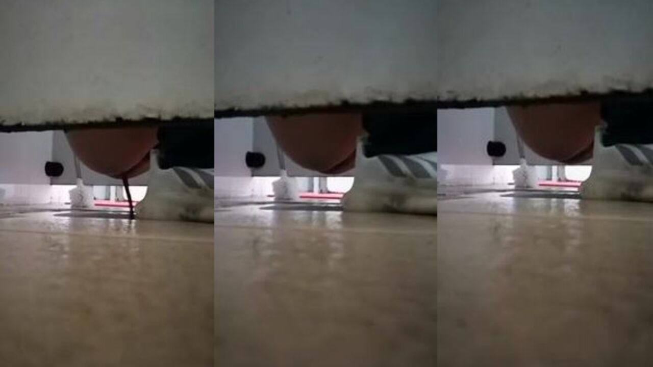 Watch this kinky voyeur take a leak in the men's toilet