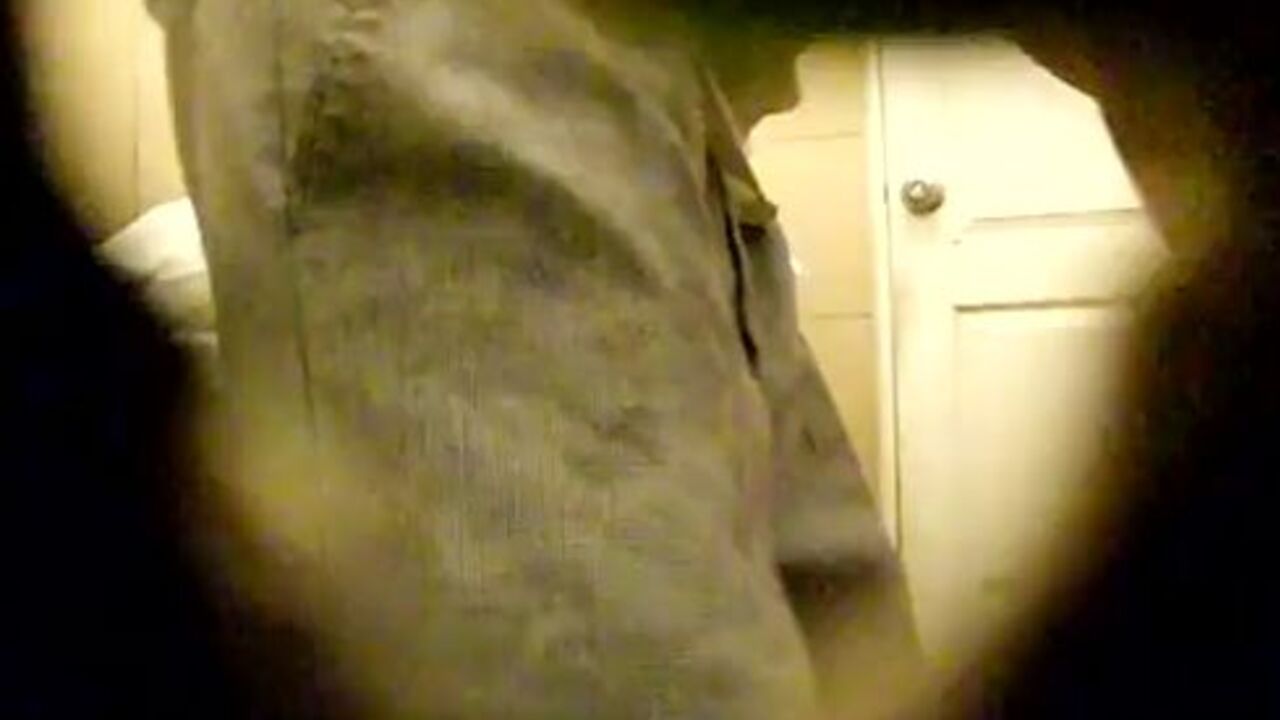Watch as a horny voyeur shits in his own scat while getting caught
