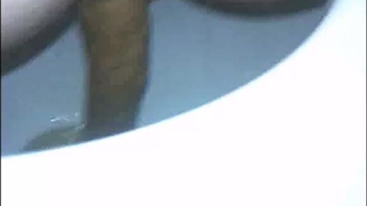 Watch this kinky slut slowly defecating in her toilet like a filthy slut