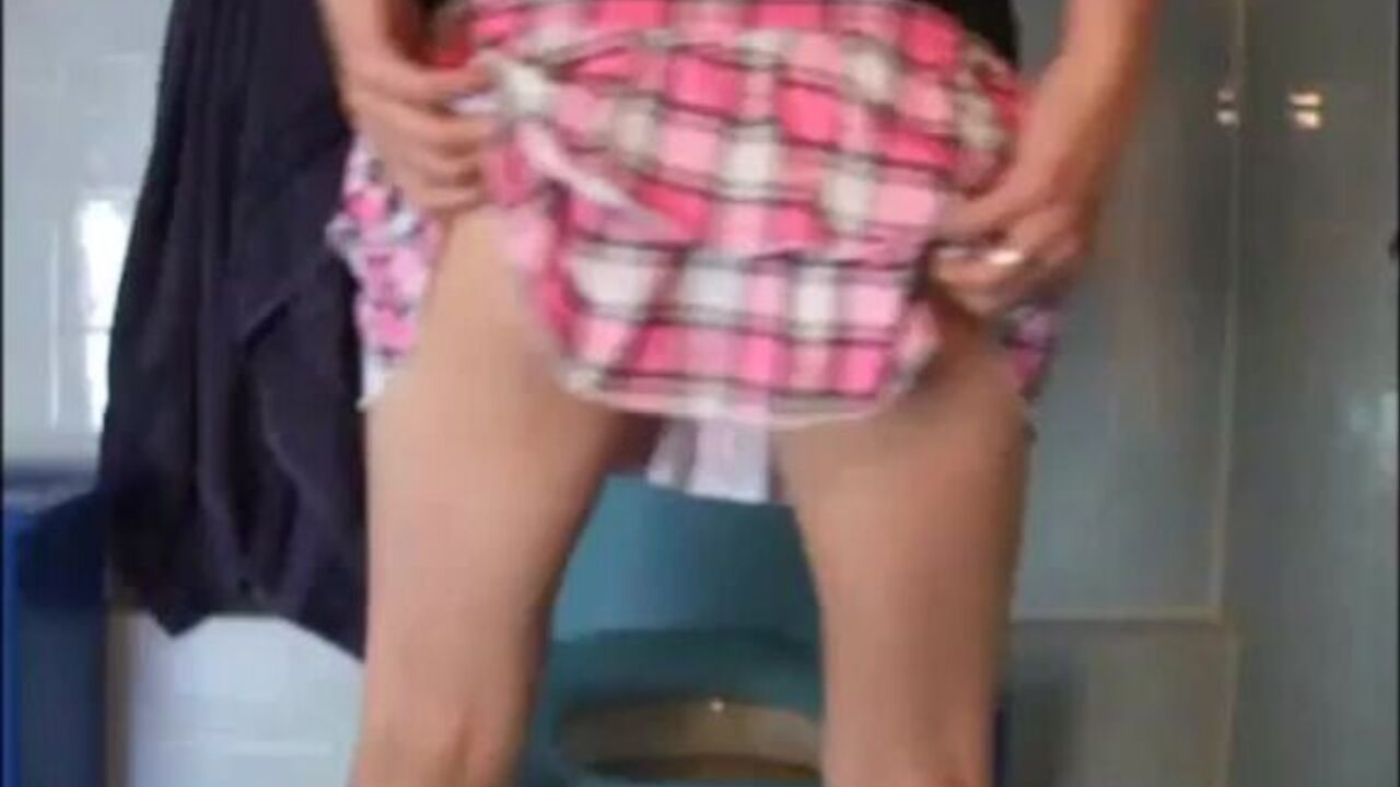 Watch this filthy slut scat in toilet and get drenched in her own pee