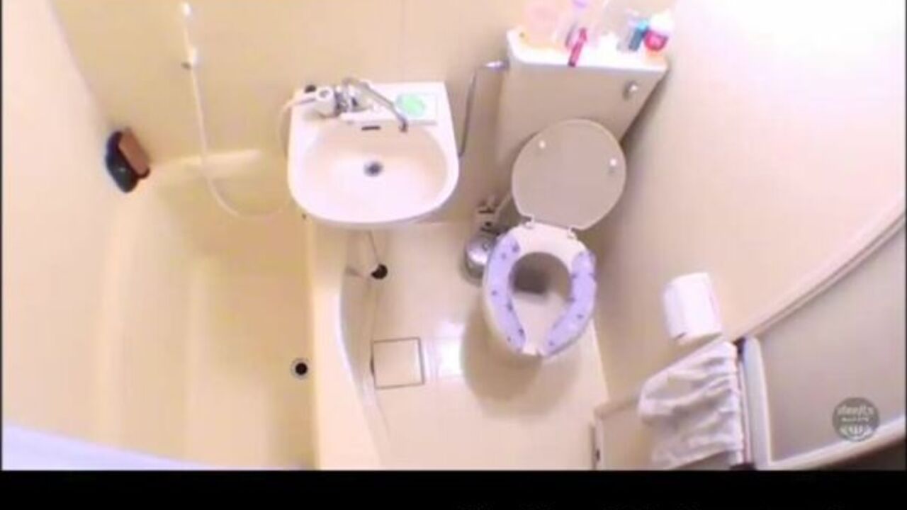 Watch this kinky Japanese toilet bowl cam girl get off in a wild scat video