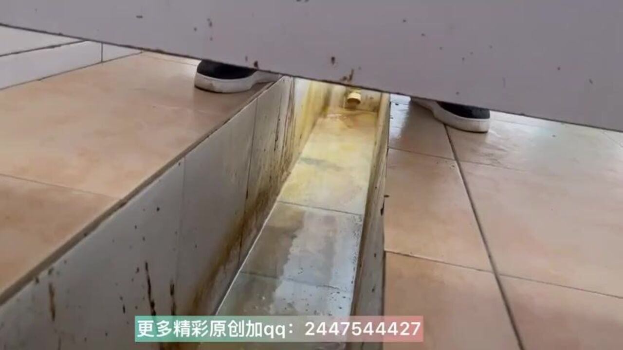 Watch this Chinese slut peeping on herself while defecating heavily in the toilet