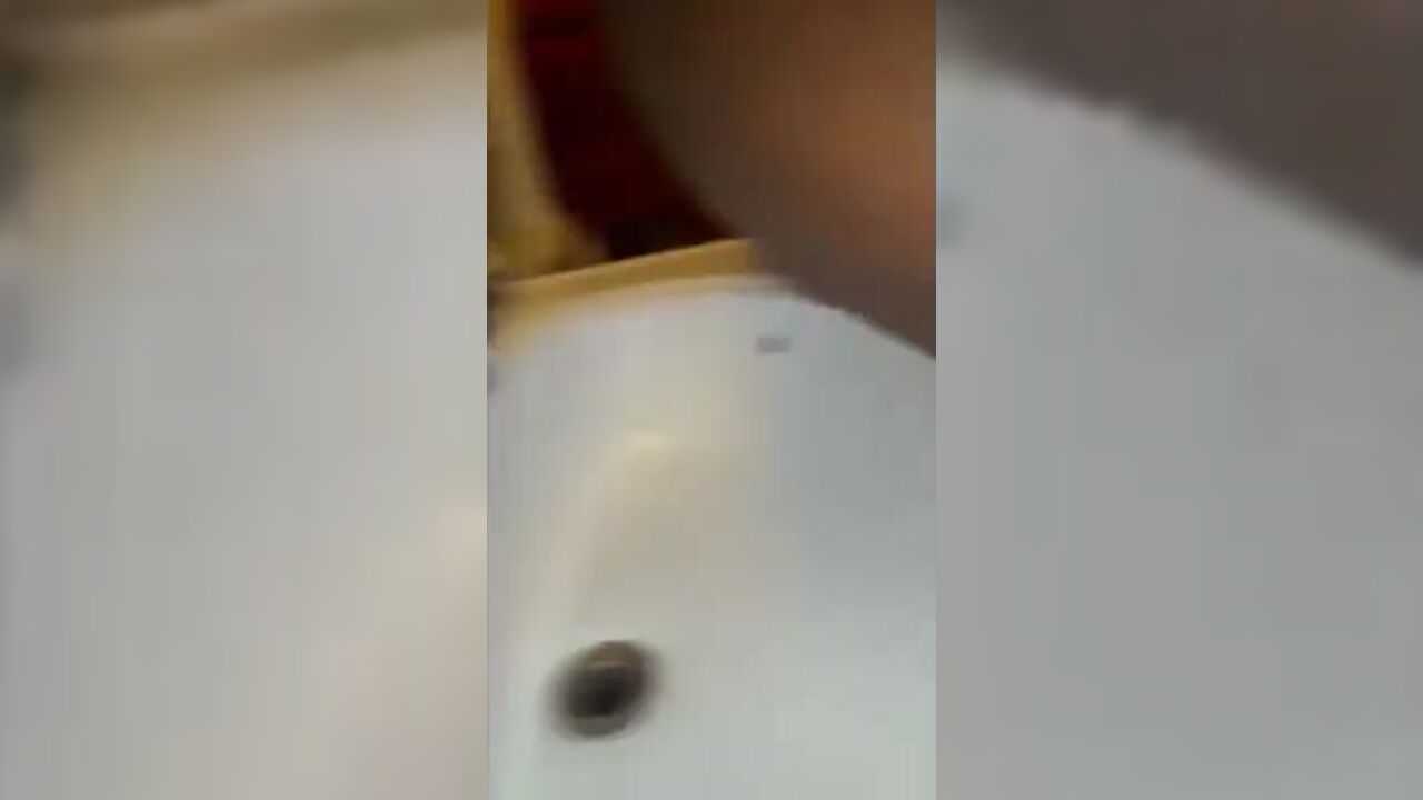Watch me take a leak into our black sink, taking a load of our ebony scat women
