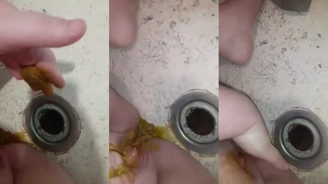 Watch this curvy slut try to rub scat in her wet pussy