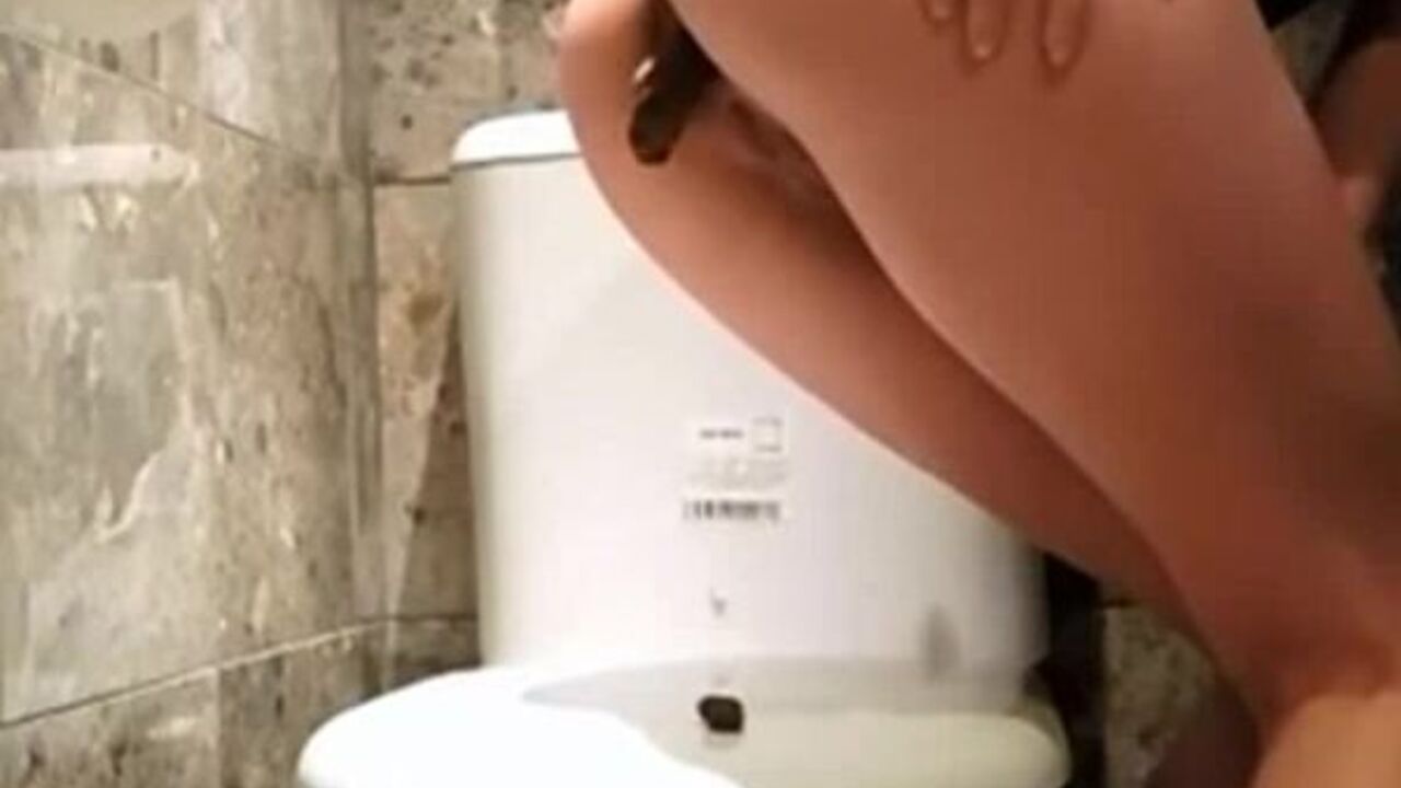 Get up close and personal with this kinky toilet fetish video