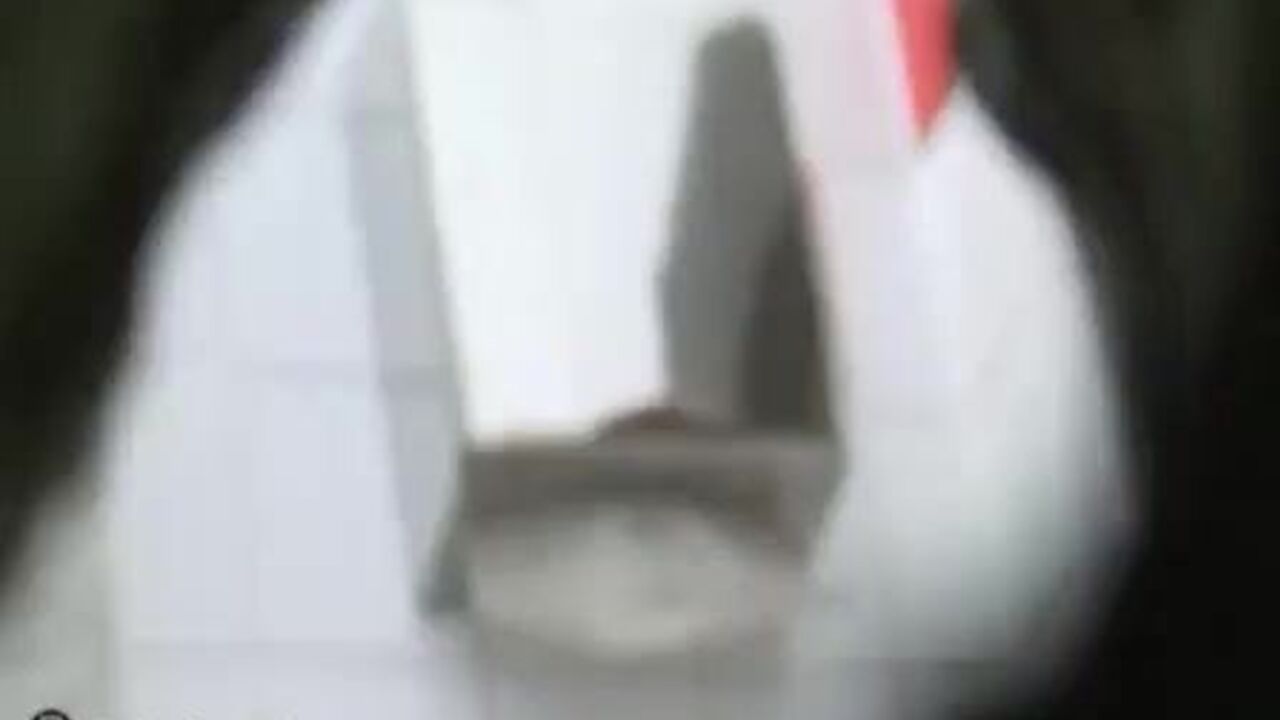 Kinky toilet slave gets a surprise from her master in a hidden toilet video