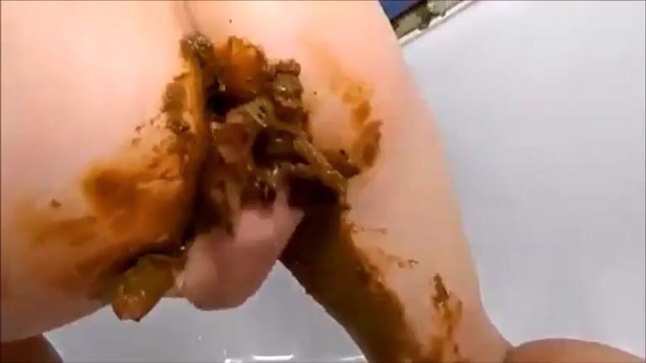 Watch this filthy girl get her ass and pussy smeared with her favorite toy & fist