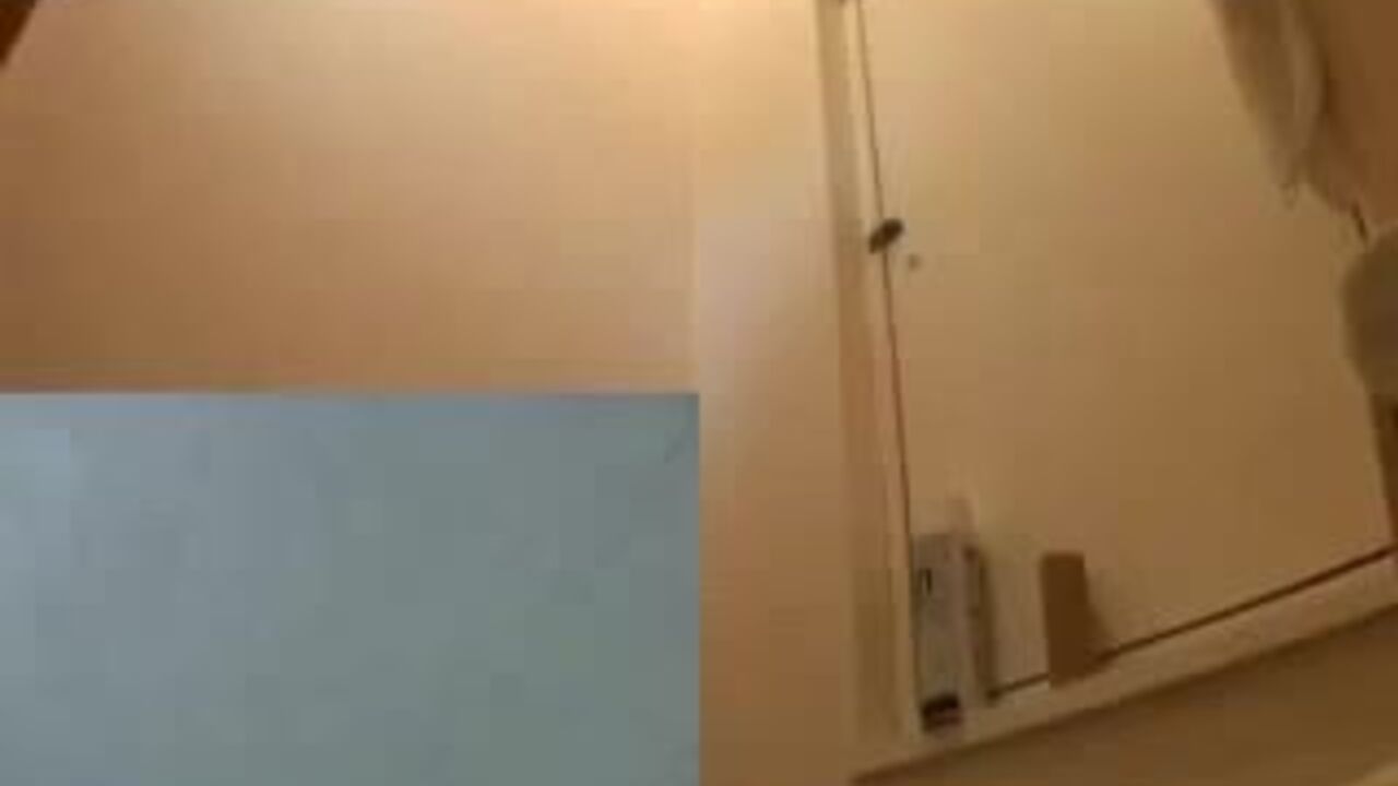 Watch this Asian babe get distracted and pee all over the place while filming herself in toilet