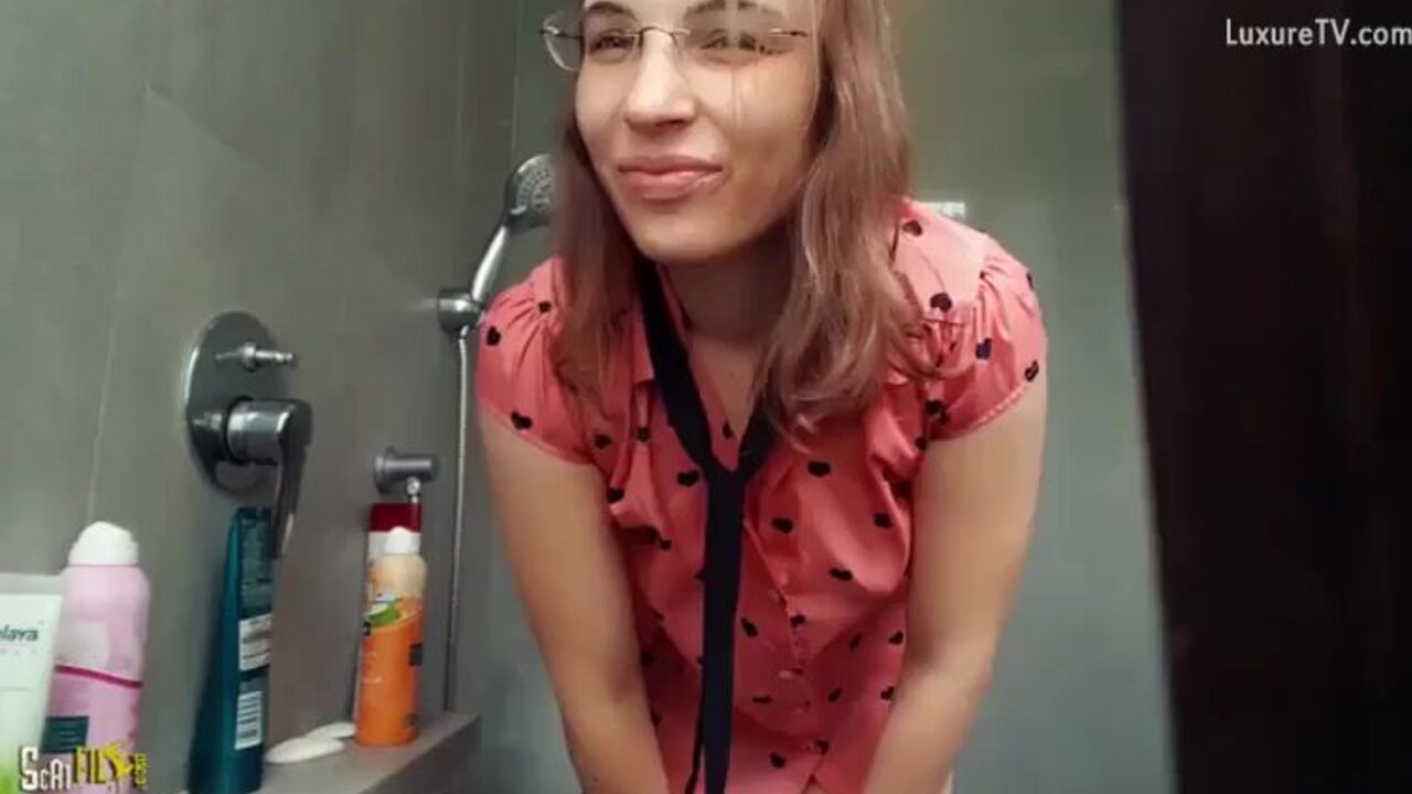 Watch this kinky girl get a hot shower and scat play