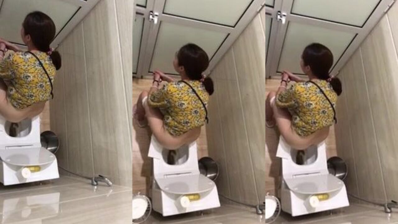 Naughty Vietnamese slave caught on spycam in the toilet