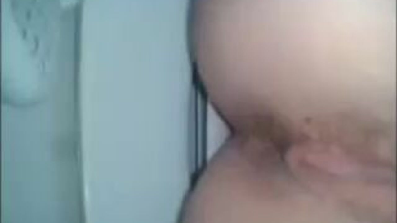 Close-up of a filthy toilet with a girl getting off on scat play