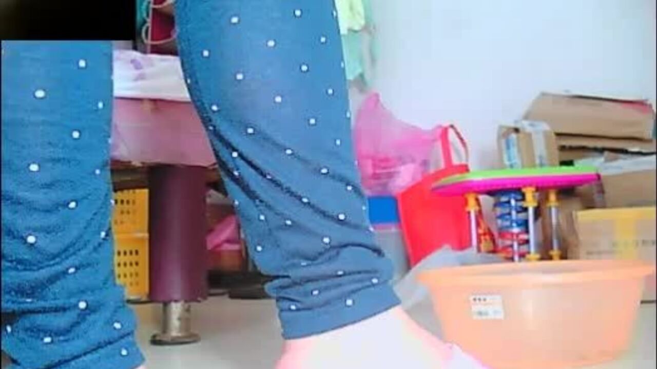 Watch this hot Chinese girl get down and dirty with her own pee