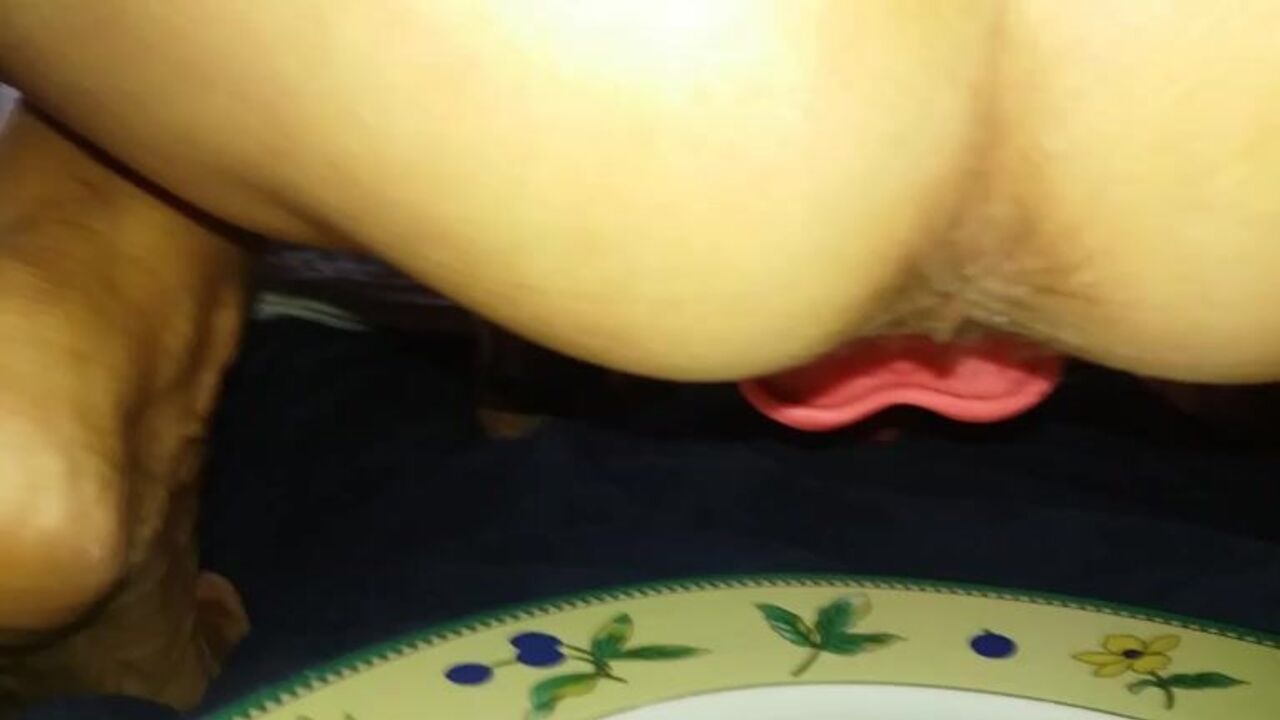 Watch this filthy scat slave get her pussy and ass stuffed with manger pendants
