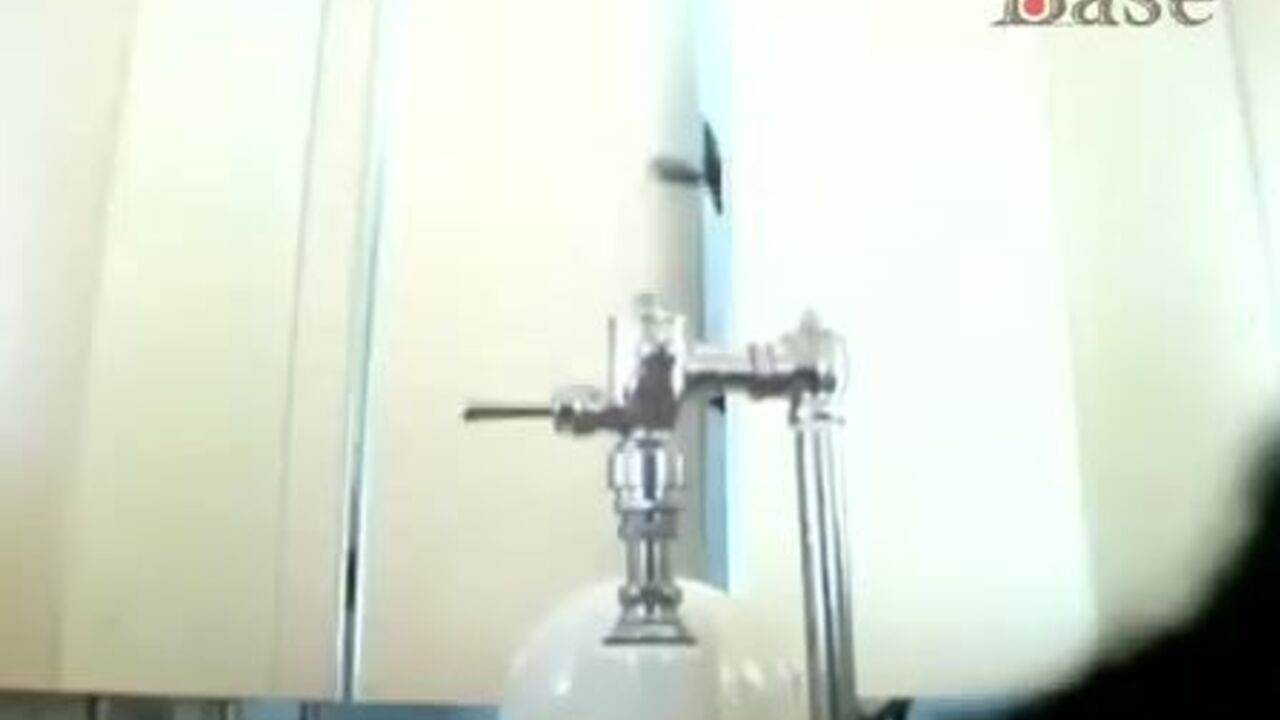 Watch this Japanese office girl get a dirty surprise in her toilet - Japanese toilet camera and scat porn