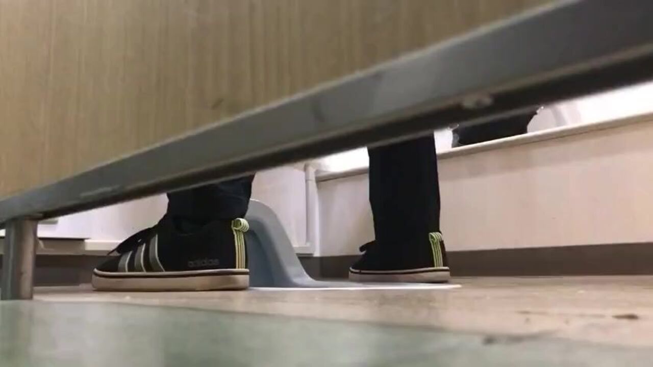 Watch as these guys squat and pee in the toilet like it's no big deal