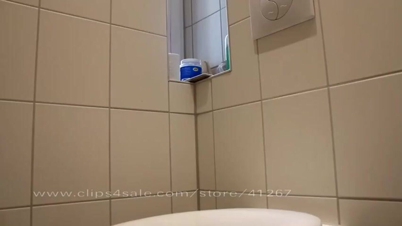 Naughty petite slut uses toilet to get off in scat porn video