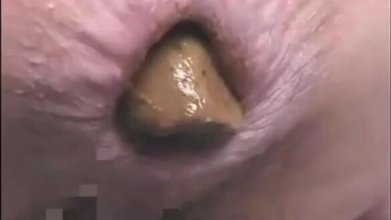 Watch this filthy woman take a massive load in her scat up close and personal