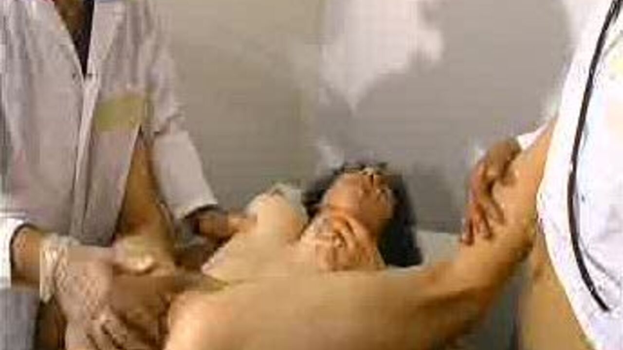 Watch this kinky porn video as a filthy slut takes a deep enema and gets her scat wet