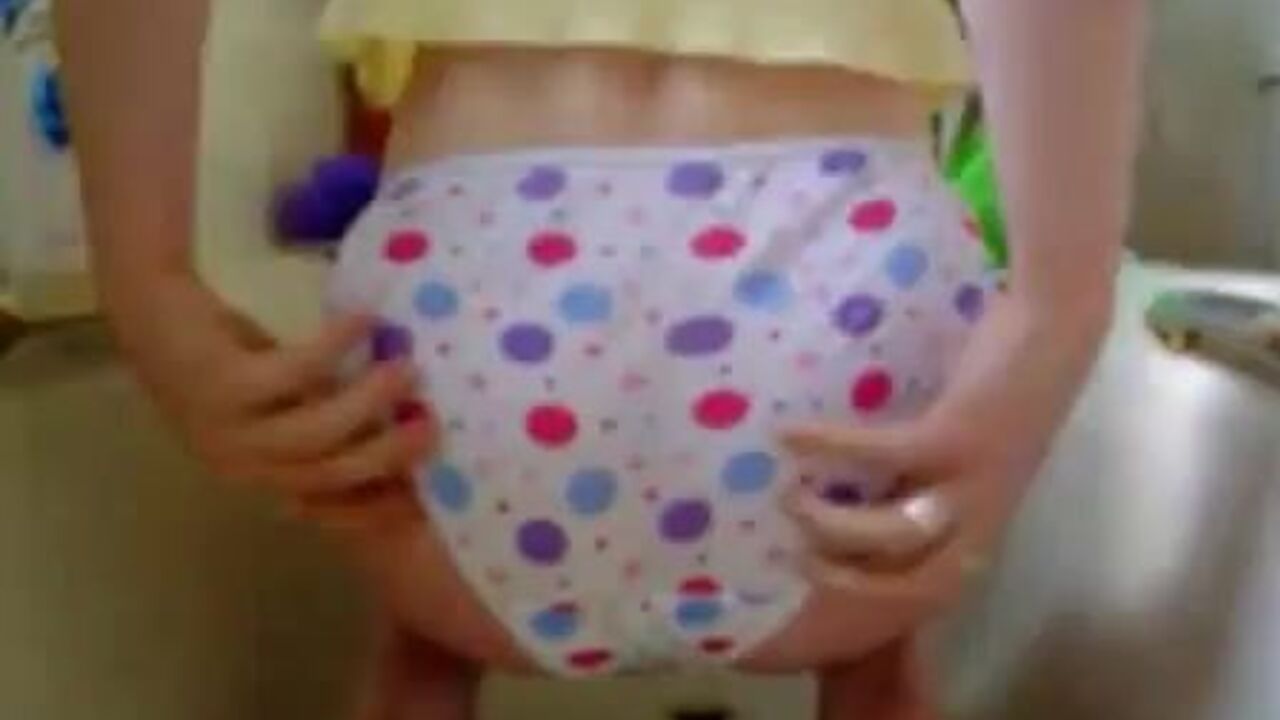 Watch this filthy slut get her panties filthy with scat and pooped out