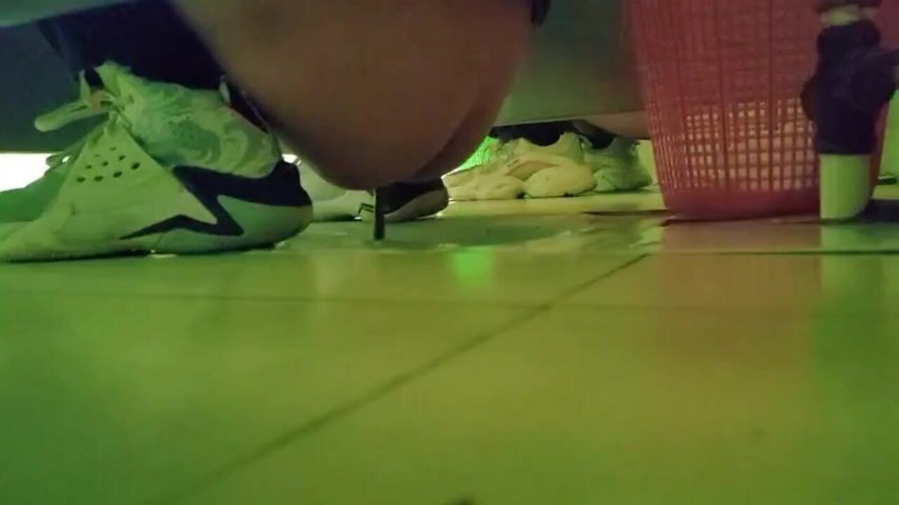 Watch this voyeuristic dude take a piss in his toilet and get a surprise from his slutty girlfriend