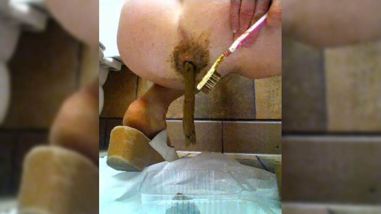 Watch this massive load of scat play out in this porno of scat slaves