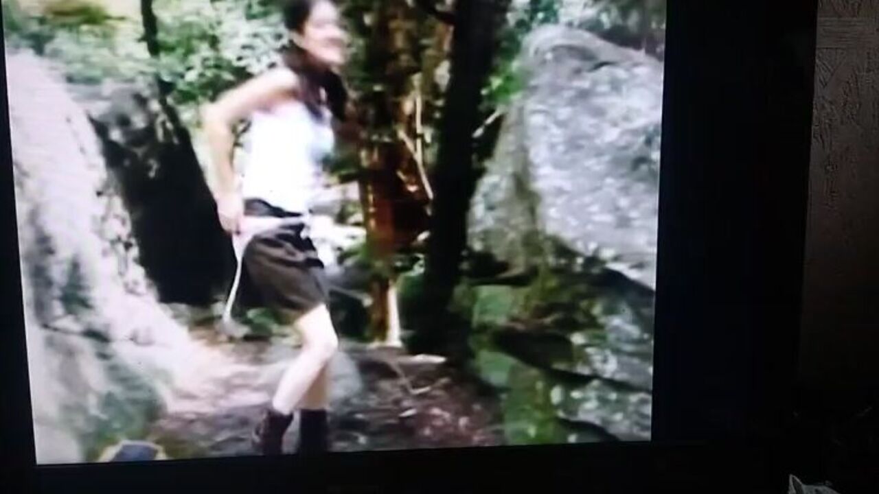 Watch this filthy slut scat in the woods and get drenched in her own pee