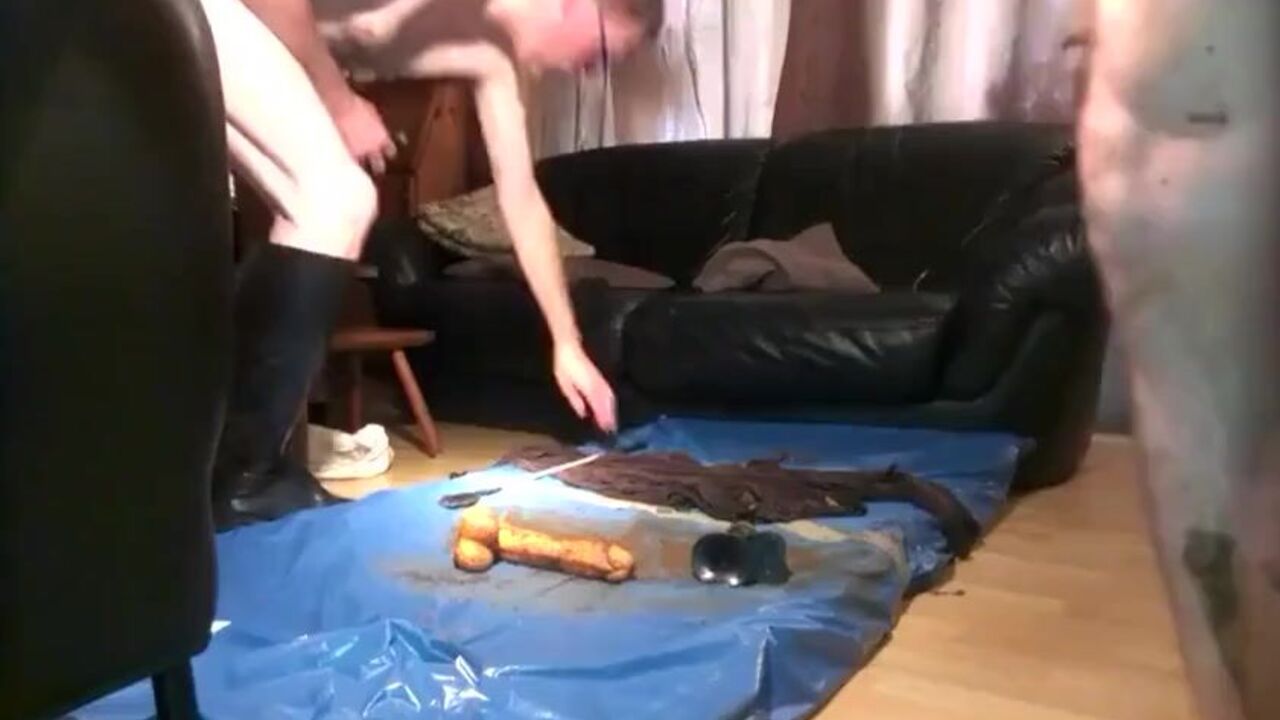 Watch this messy scat show with pigtails, dildos, and more!