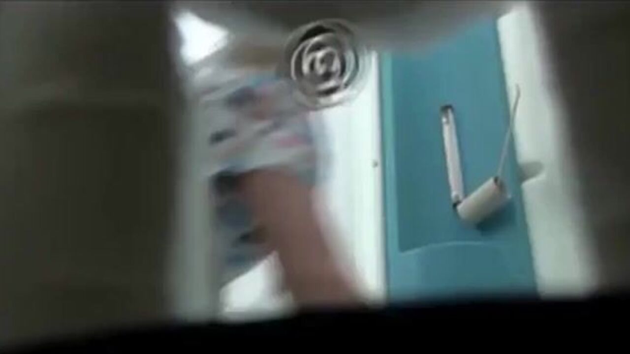 Spy on your naughty slave while she takes a leak in the porta potty