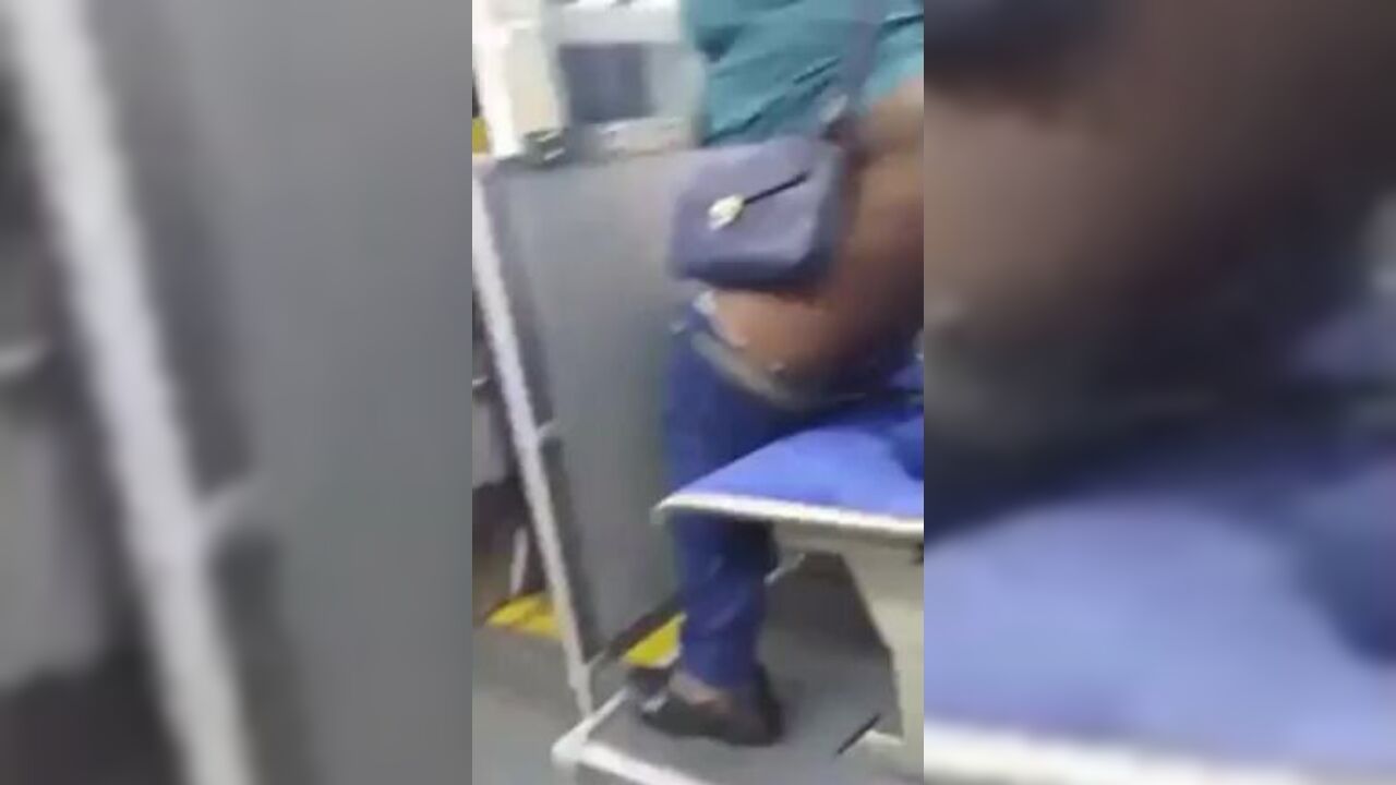Watch this filthy black slut piss all over a bus seat in public exhibitionist frenzy!