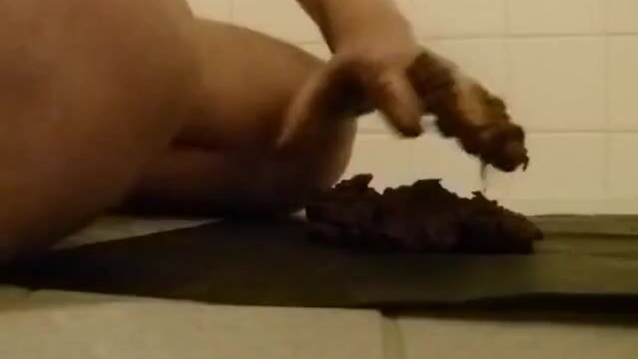 Watch this kinky chubby slut get a taste of her own scat and spread it around for all to see