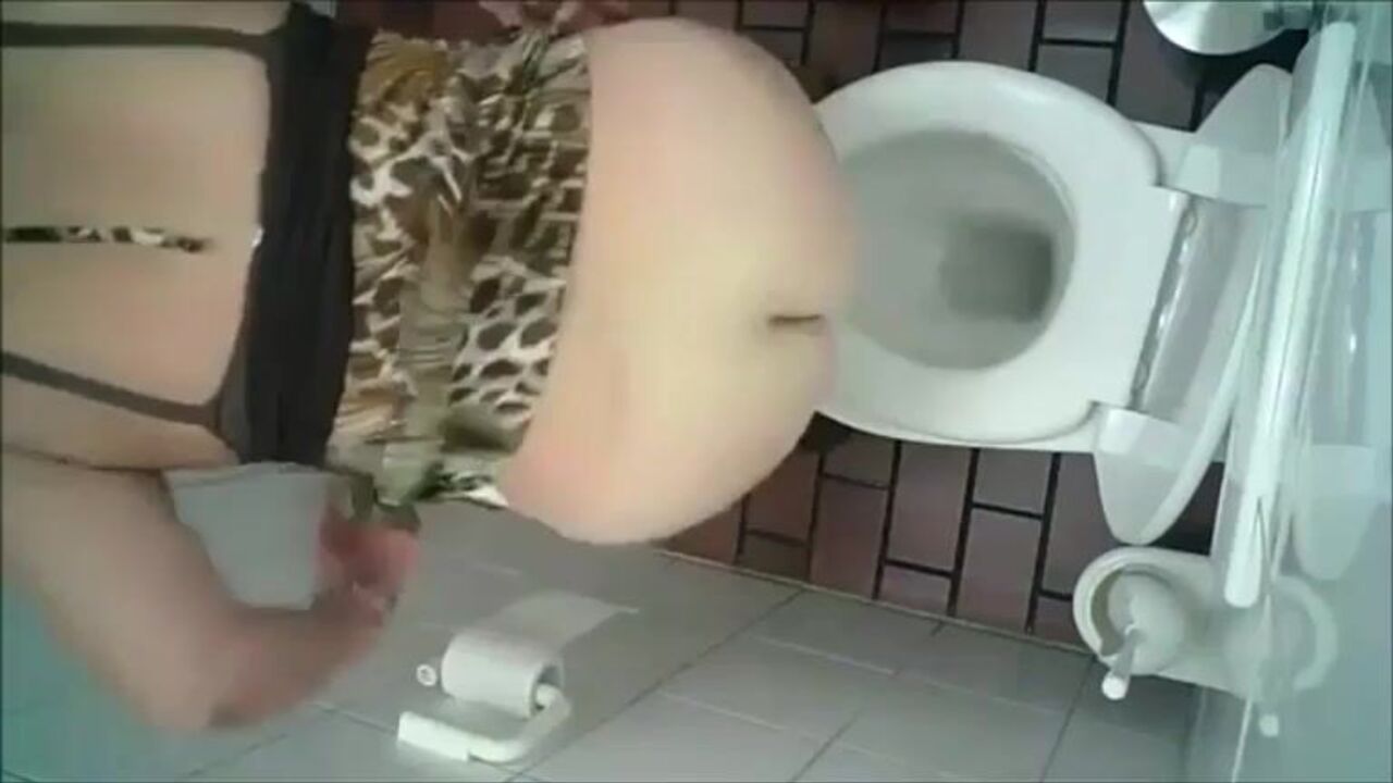 Watch this slutty woman get caught shitting in public and receive a public humiliation