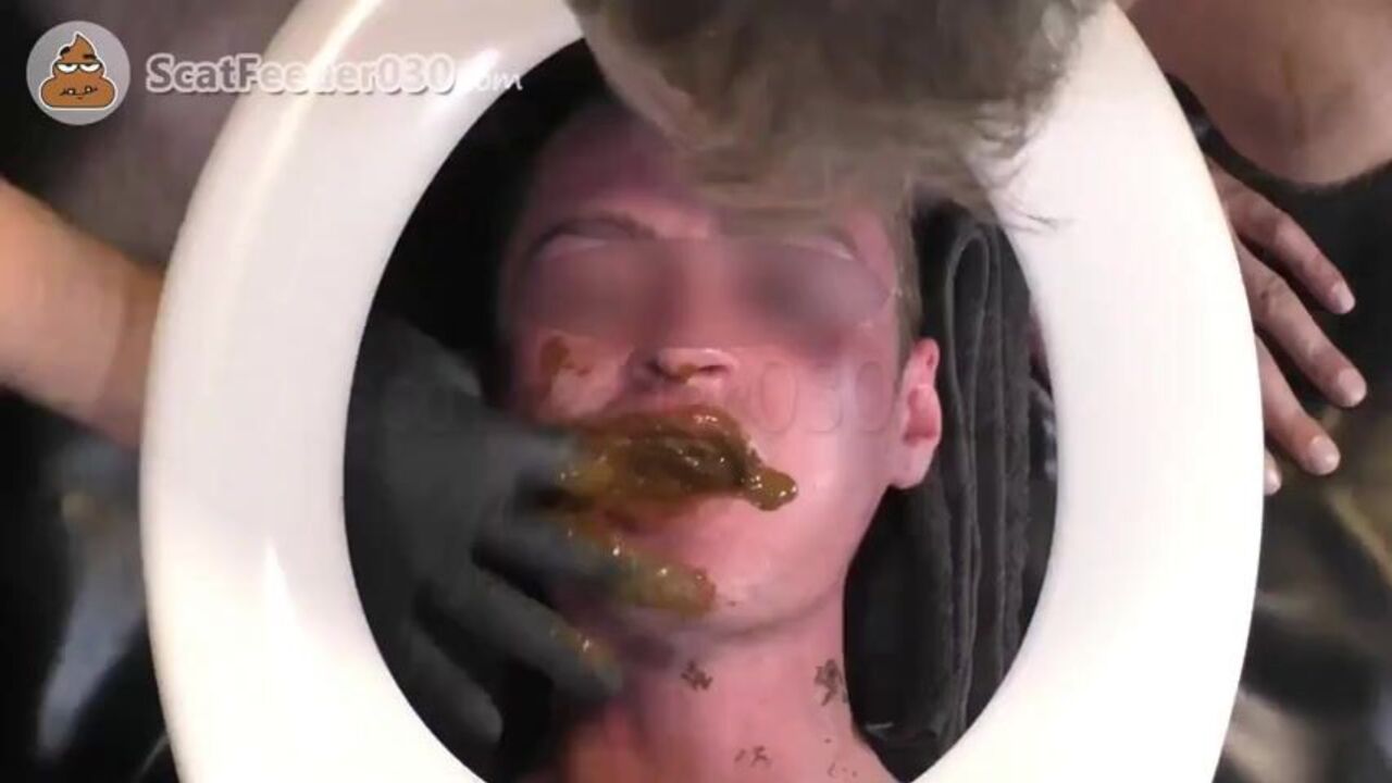 Watch this young toilet boy devour daddy's filthy scat with his mouth and hands
