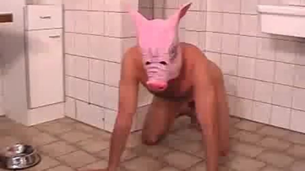 Watch as this dominant woman feeds pigtails to her pigs in this hot femdom clip