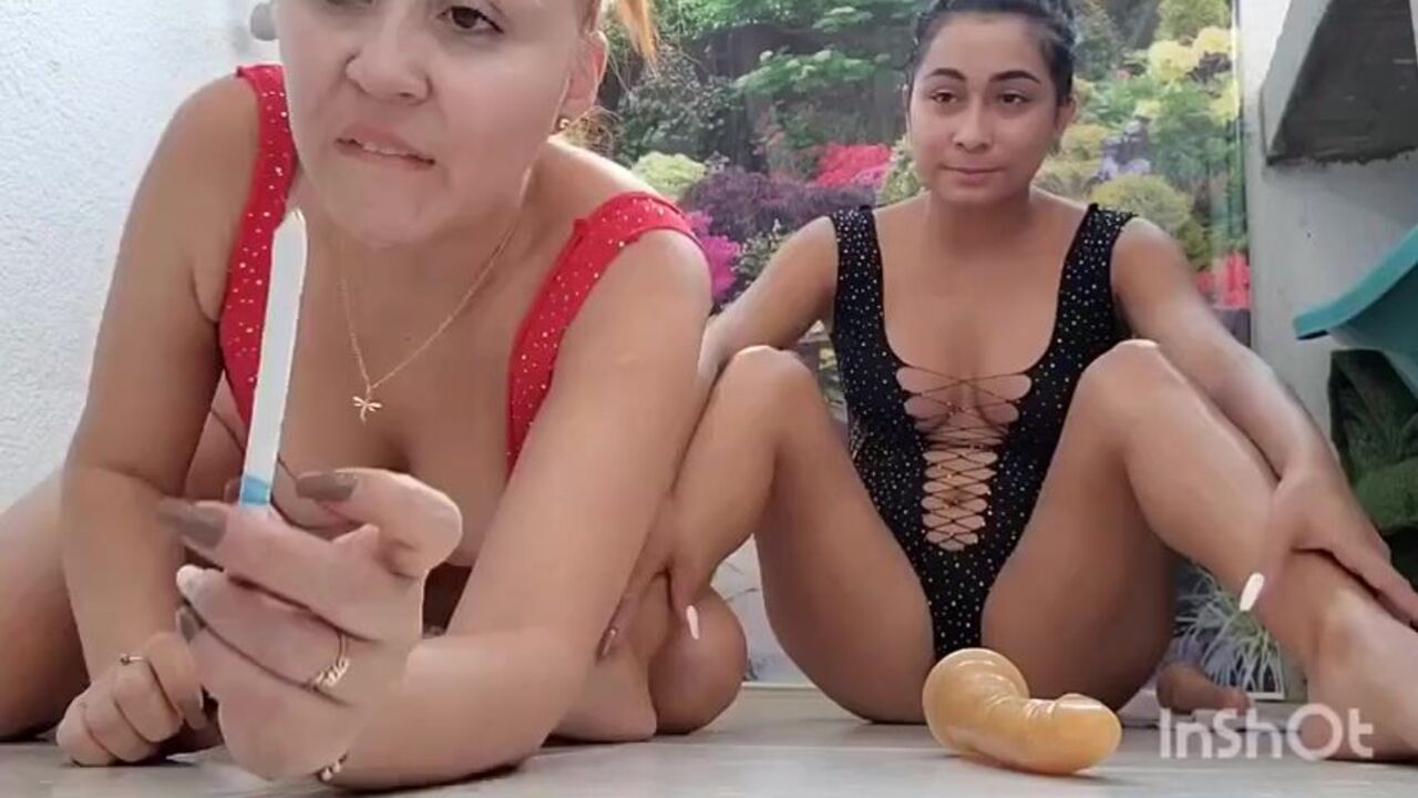 Watch two dirty Latina babes smeared in scat play with dildos and spit