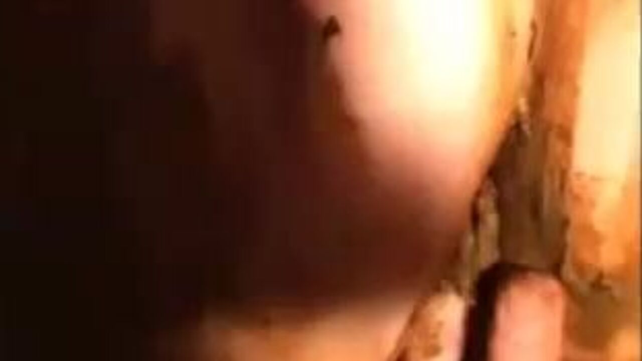 Watch this dirty slut spreading her scat all over her body in scat porn video